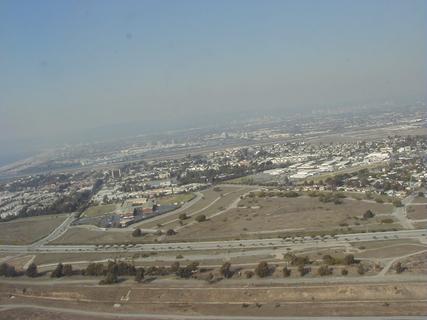 Taking off from LAX overlooking LA<br>Location: <a href="https://www.google.com/maps/search/?api=1&query=33.94937,-118.42979" target="_new">Over California</a>
